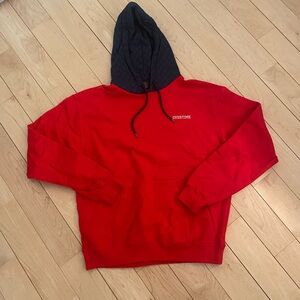 Overtime red hoodie features a contrasting navy hood size large